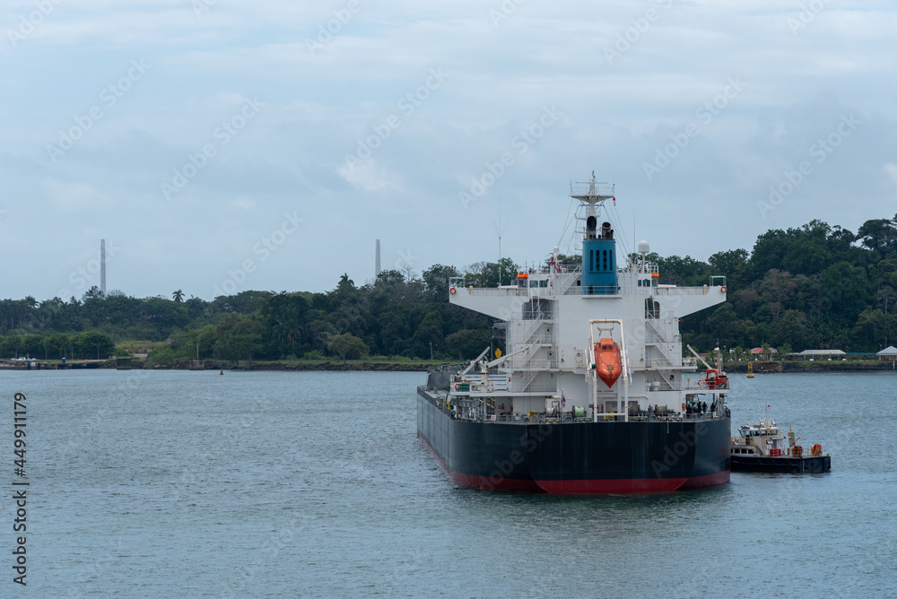Panama Canal, cargo ship On Gatun Lake waiting to transfer Locks on her way to Atlantic Ocean. Panama Canal, cargo ship On Gatun Lake waiting to transfer Locks on her way to Atlantic Ocean.