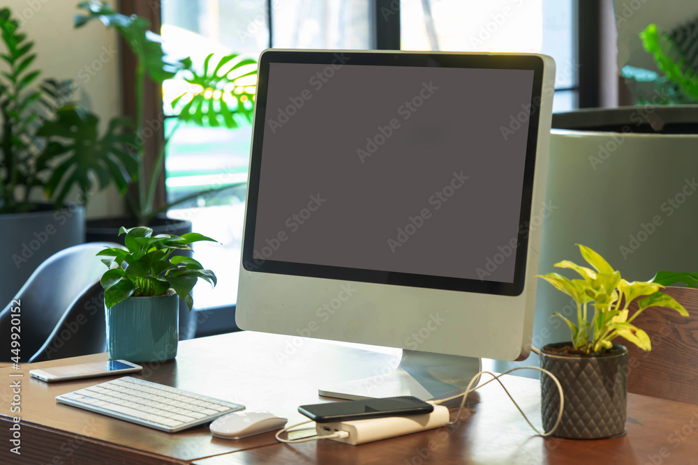 computer on desk in office computer on desk in office