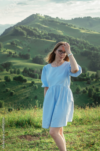 Woman in blue dress in Alta...