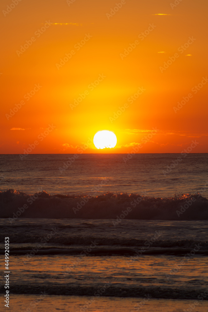 Beautiful sunrise in Santinho's beach, Brazil