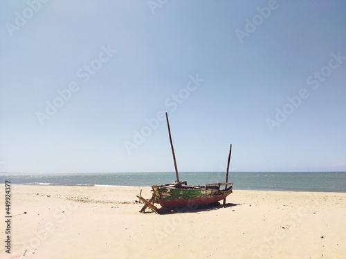 fishing boat on beach © Yuri