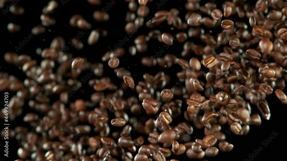 Super slow motion of coffee beans collision. Filmed on high speed cinema camera, 1000 fps. Super slow motion of coffee beans collision. Filmed on high speed cinema camera, 1000 fps.