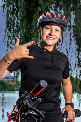 Young woman with bike. Transport and healthy lifestyle concept. Mountain biking - woman with fatbike