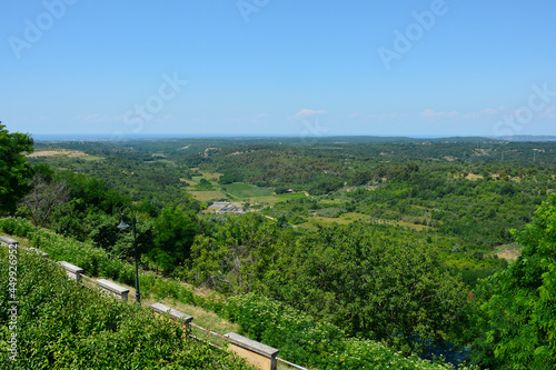 The view of the surrounding summer landscape from the historic medieval hill village of Buje in Istria, Croatia 