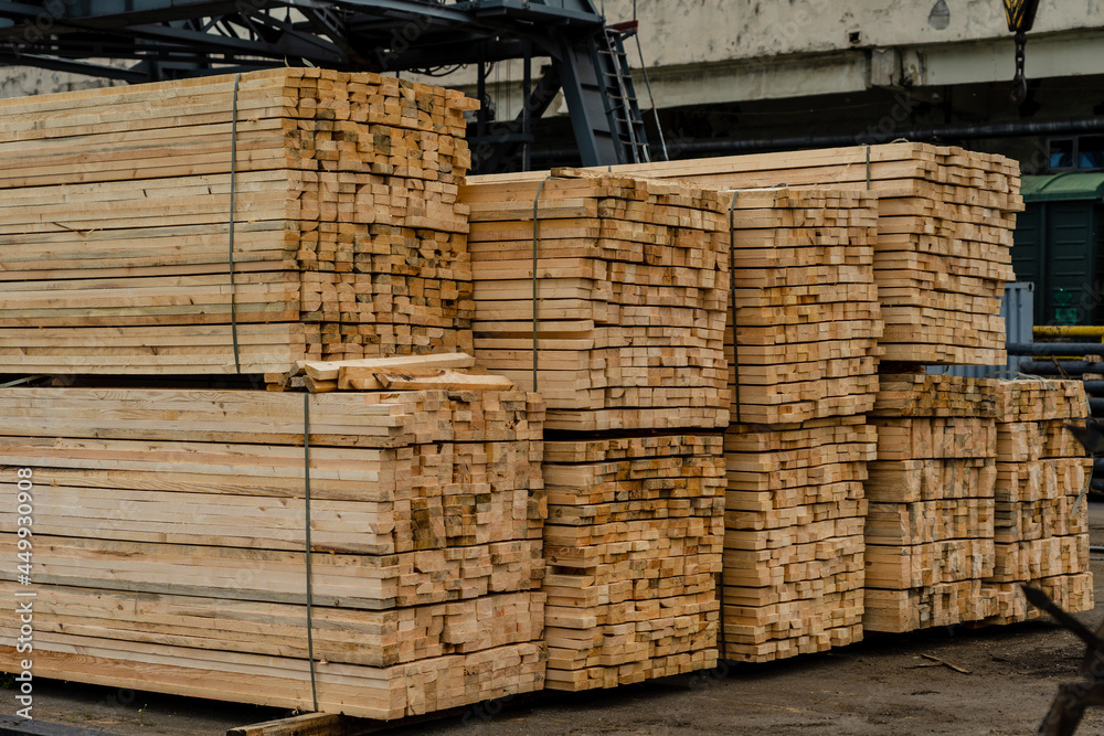Stacks of timber ready for shipment in sea port in Ukraine Stacks of timber ready for shipment in sea port in Ukraine