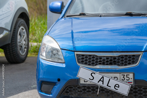 Cars in a row. Used car sales on the market. The concept of the automotive business.