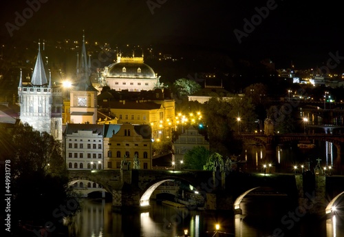 National Theater and bridges over the Vltava river in Prague at night
