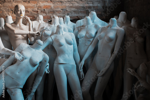 Photography many display model mannequins in warehouse