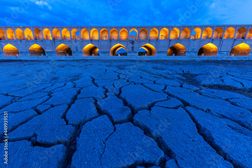 Siosepol Bridge at the twilight in times of drought in Isfahan, Iran photo