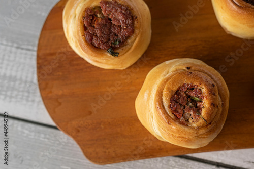 Baked snacks ​​- bread stuffed with pepperoni sausage