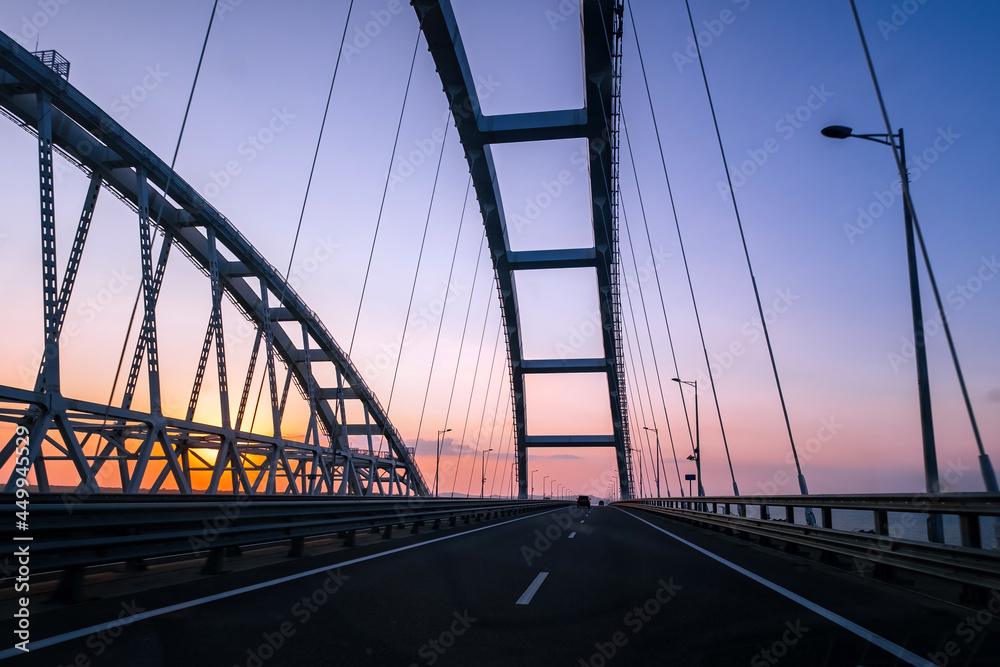 Fototapeta premium Crimea bridge over Kerch Strait at the evening sunset