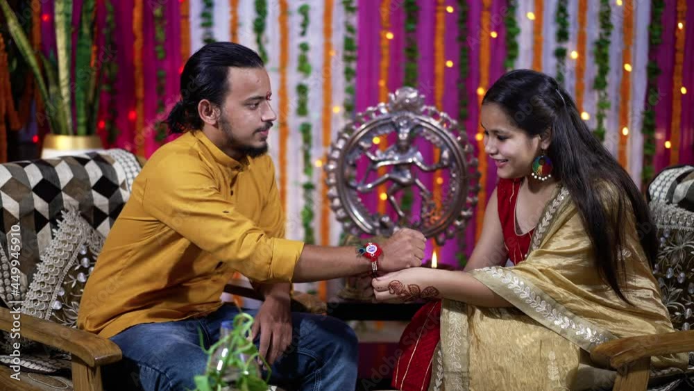 Sister Tying The Rakhi Raksha Bandhan To Brothers Wrist During Festival Or Ceremony Raksha 9792