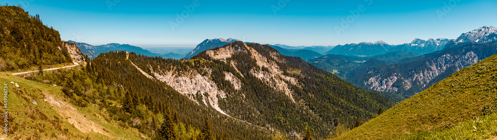 High resolution stitched panorama of a beautiful alpine summer view with the Kreuzeckbahn at the famous Alpspitze summit near Garmisch Partenkirchen, Bavaria, Germany