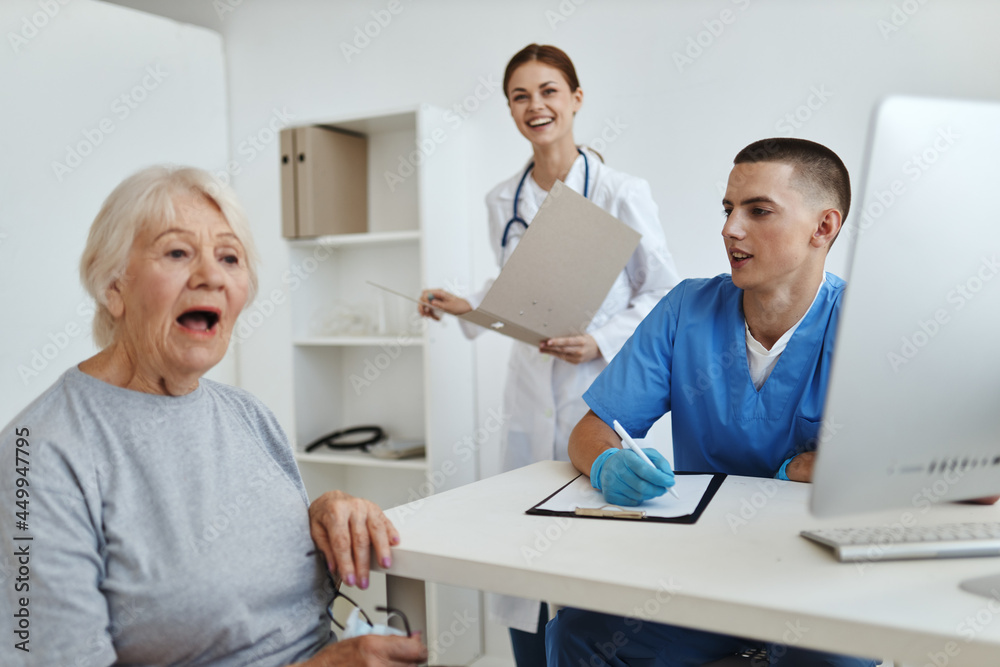 elderly woman patient at the doctor's and nurse's appointment service hospital