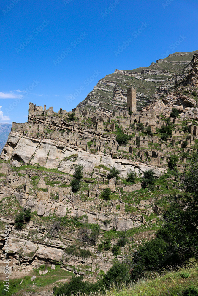 ruins of the ancient village old Kahib in Dagestan, Russia with mountain on the background
