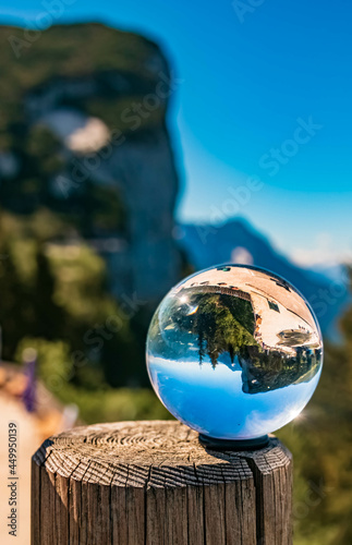 Crystal ball alpine landscape shot at the famous Steinplatte summit near Waidring, Tyrol, Austria photo