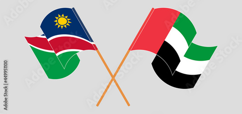 Crossed and waving flags of Namibia and the United Arab Emirates