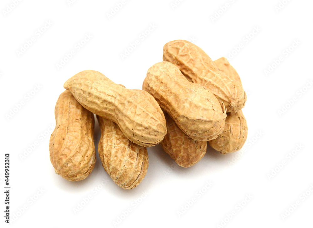 Composition from nuts on the white isolated background Composition from nuts on the white isolated background