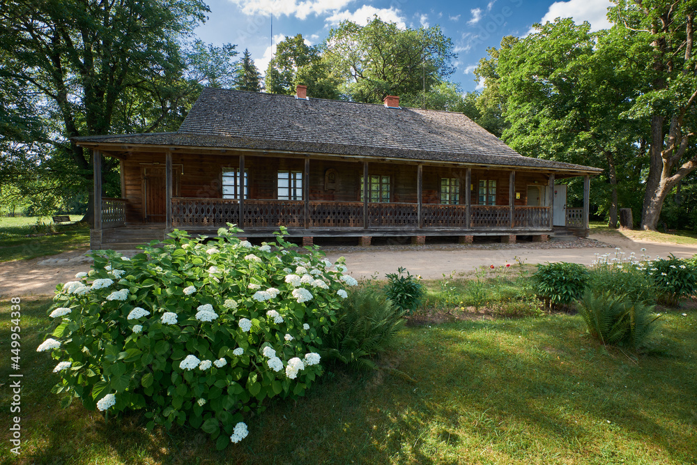Wooden house - place of birthplace of belarusian poet Francis Bogushevich in agricultural township Kushlyany, Smorgon district, Grodno region, Belarus. Wooden house - place of birthplace of belarusian poet Francis Bogushevich in agricultural township Kushlyany, Smorgon district, Grodno region, Belarus.