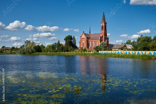 Old ancient church of St Anthony of Padua by river in Postavy, Vitebsk region, Belarus.