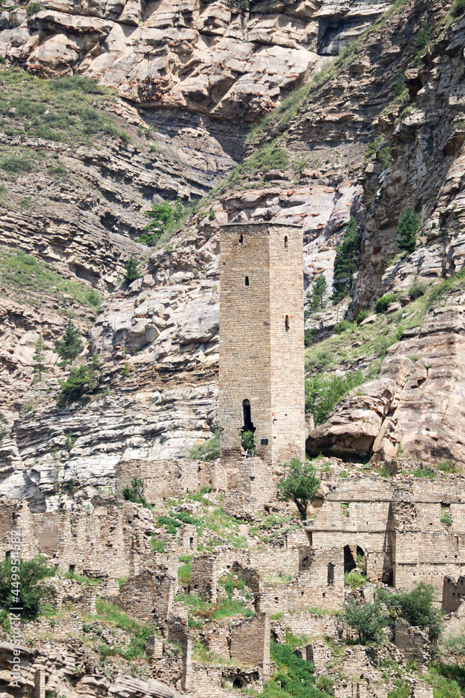 stone battle avar tower and ruins of ancient abandoned village old Kahib in Dagestan, Russia