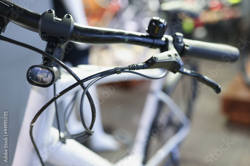 Bicycle handlebars with handbrake and flashlight closeup