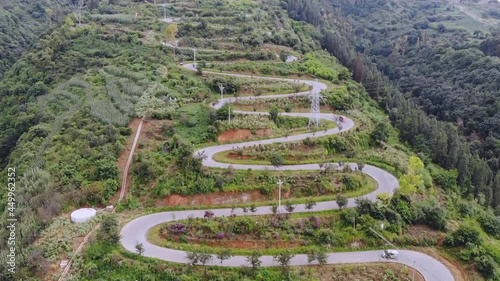 Kunming. Aerial photo taken shows a winding road on a mountain in Yiliang County of Kunming, southwest China's Yunnan Province. The famous winding road has 68 bends in a length of 6.3 kilometers. photo