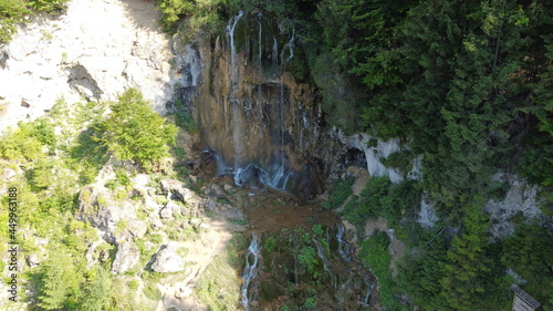 Waterfall in the national park. Waterfall full of mosses. Waterfall Pisoaia