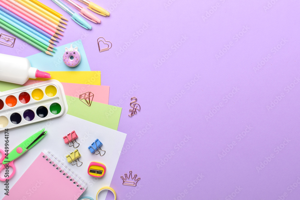 Stationery on a purple background with a place for text. Stationery on a purple background with a place for text.