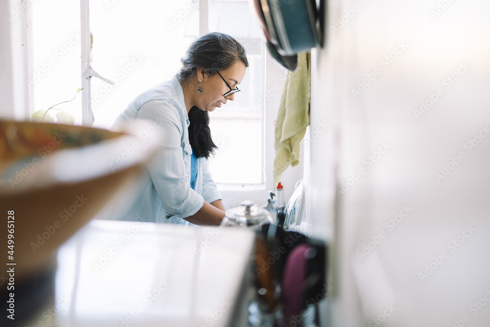 Mexican real woman cooking in the kitchen Mexican real woman cooking in the kitchen