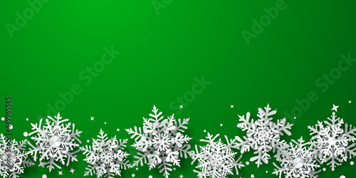 Wallpaper Mural Christmas background of paper snowflakes with soft shadows, white on green background Torontodigital.ca