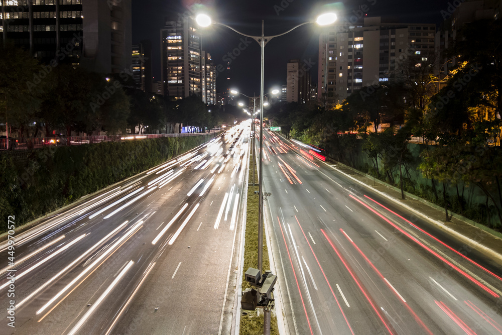 Motion lapse of traffic jan on 23 de Maio Avenue at night, in south side of Sao Paulo city.