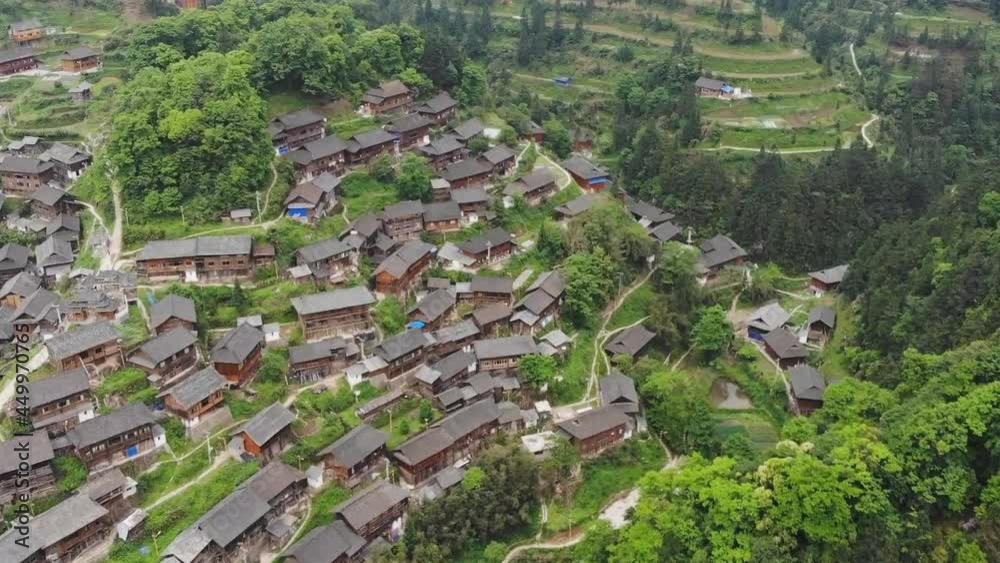 Aerial view of traditional wooden building cluster of Xijiang Qianhu Miao Village (The One Thousand Household Miao Village) , in southeastern Guizhou province of China. Aerial view of traditional wooden building cluster of Xijiang Qianhu Miao Village (The One Thousand Household Miao Village) , in southeastern Guizhou province of China.