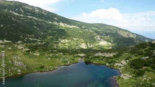 Flight over the Popovo Lake, a glacial lake situated in the northern section of the Pirin mountain range in Bulgaria.