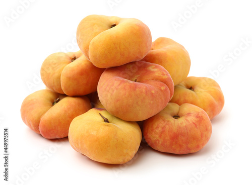 chinese flat peaches on white background 