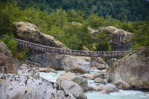 Hanging bridge at the Queulat National Park, Patagonia, Aysen, Chile photo