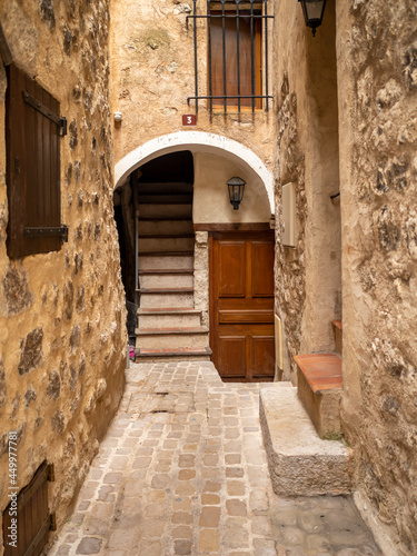 traditional stone houses with arch in small provencal village in the French Riviera back country