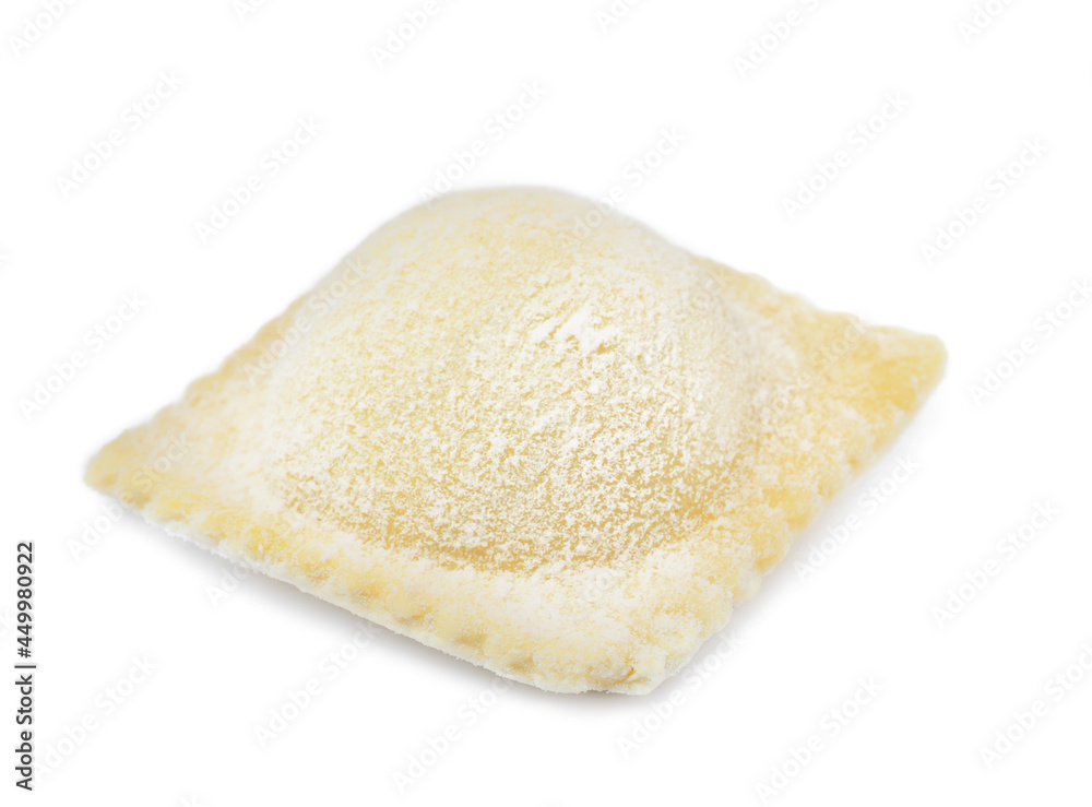 Uncooked ravioli with filling on white background