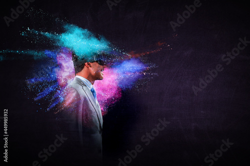 man wearing virtual reality goggles © Sergey Nivens