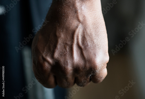 Closeup of a black hand in fist