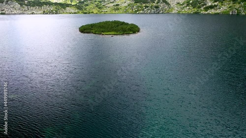 Flight over the Popovo Lake, a glacial lake situated in the northern section of the Pirin mountain range in Bulgaria.