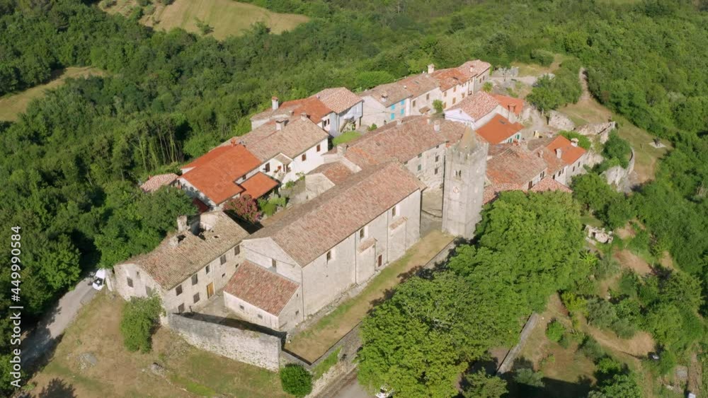 Aerial shot rising over the village of Hum, Croatia that tilts down as it flies over. Aerial shot rising over the village of Hum, Croatia that tilts down as it flies over.
