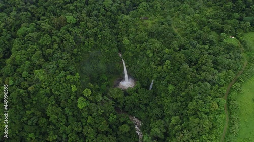 Aerial shot La Fortuna waterfall beautiful Costa Rica lush rain forest, 4K photo