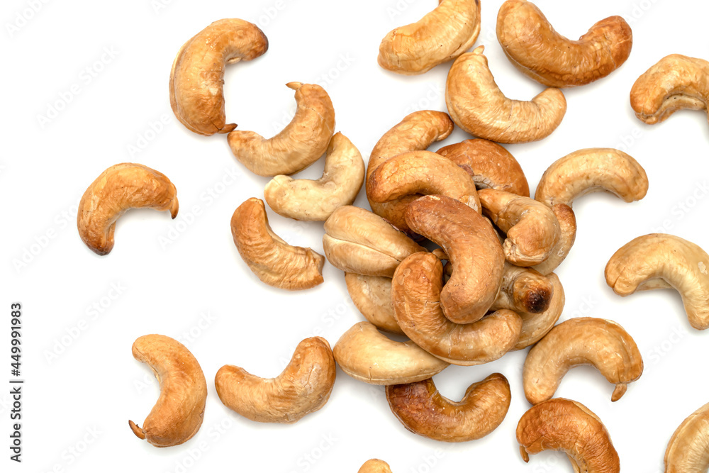 Roasted nuts in glass bowl isolated on white background Roasted nuts in glass bowl isolated on white background