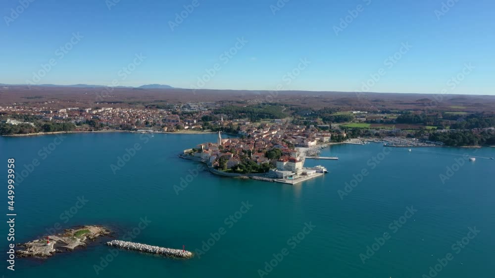 Panorama Of Porec Town At Daytime With Calm Blue Sea At Daytime In Istria Peninsula, Croatia. - aerial Panorama Of Porec Town At Daytime With Calm Blue Sea At Daytime In Istria Peninsula, Croatia. - aerial