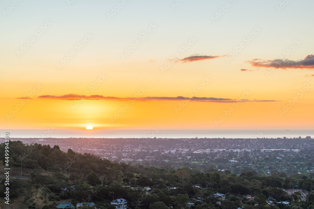 Spectacular sunset above Adelaide suburbs viewed from the Carrick Hill, South Australia