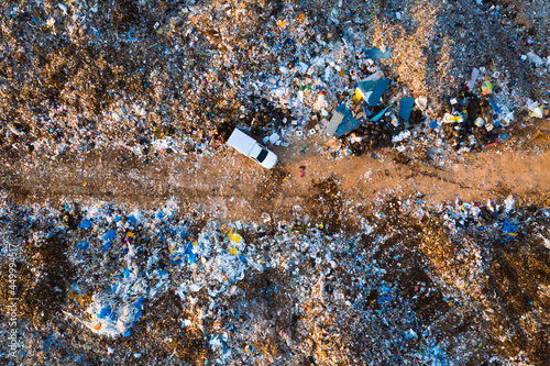 Aerial top view, large garbage pile at sorting site. Garbage pile in trash dump. Environmental pollution from consumerism household.