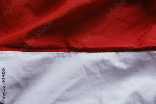 The wavy, red, and white flag of the Republic of Indonesia.