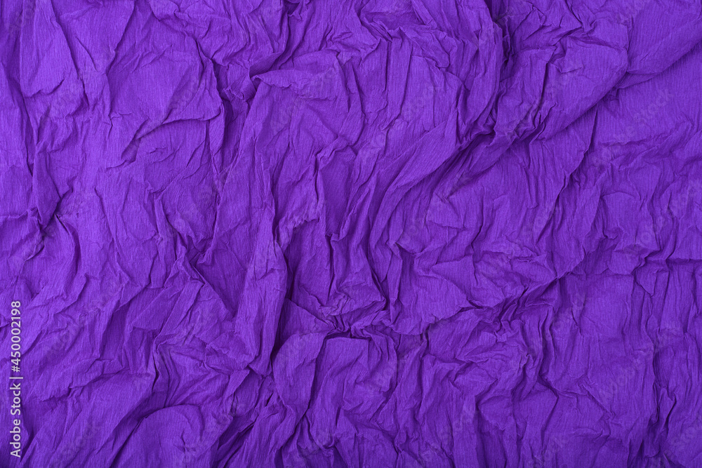 Purple crumpled paper texture background with space for text. Crumpled abstract background. Concept of template for design