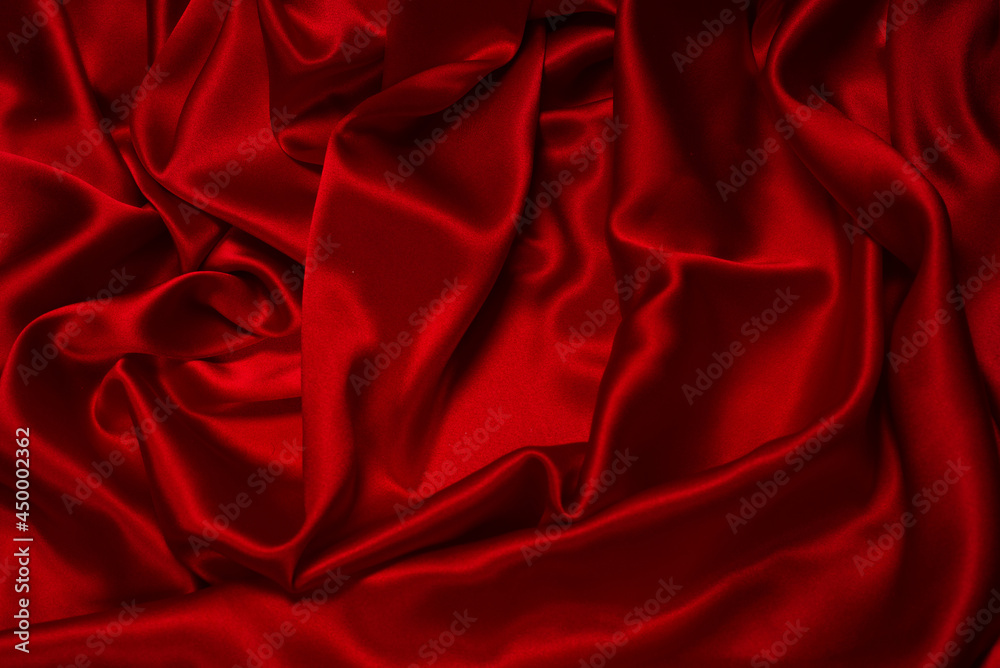 Rich and luxury red silk fabric texture background. Rich and luxury red silk fabric texture background.